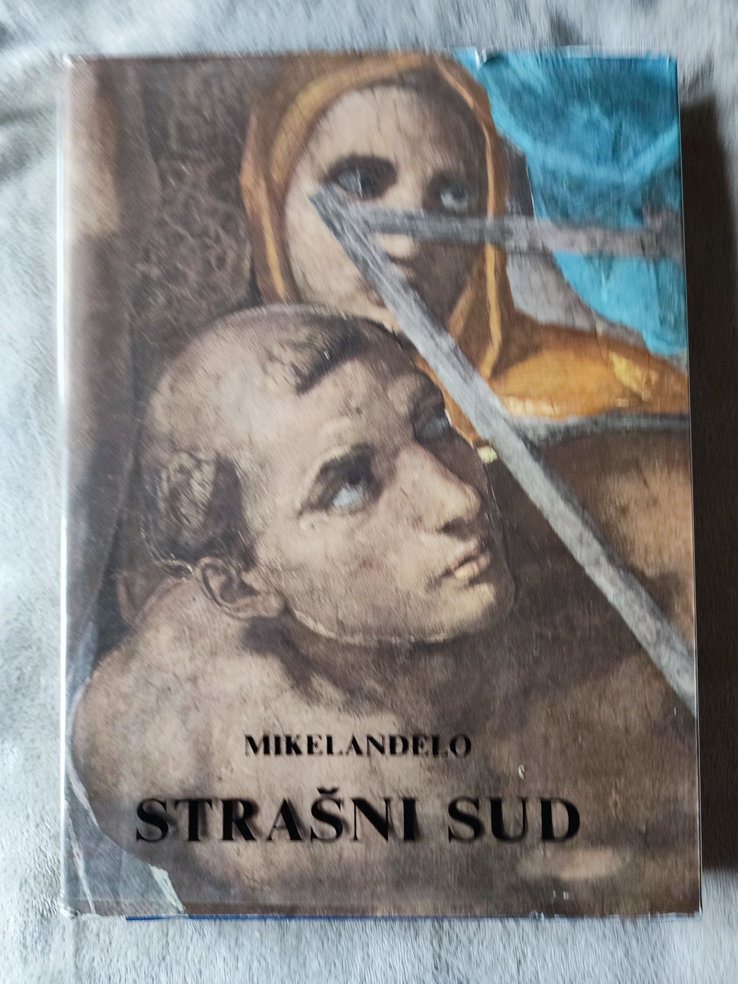 Книга по фресці Мікеланджело " Страшний суд "