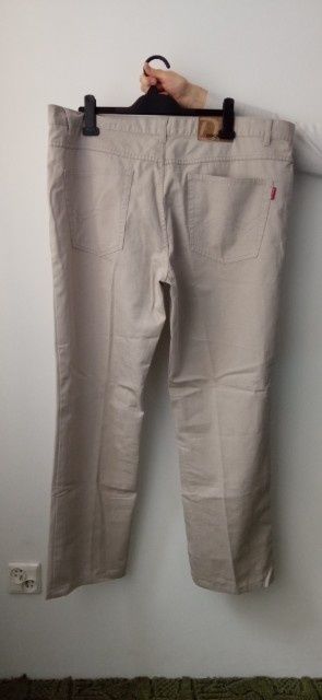 Dzinsy Nowe  bez metki duże beżowe spodnie męskie
