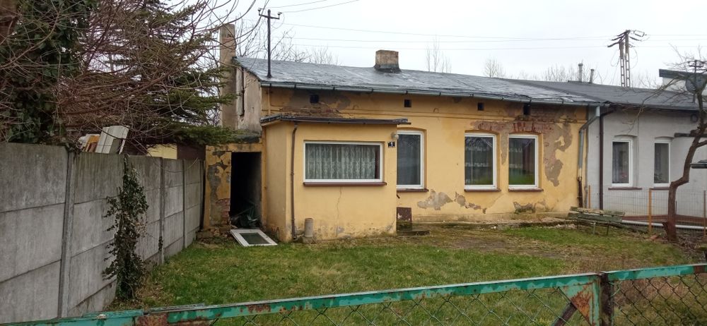 Dom w zabudowie szeregowej z działką blisko Centrum.