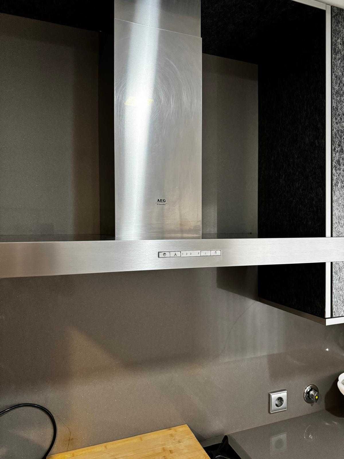 Exaustor de chaminé em Inox AEG