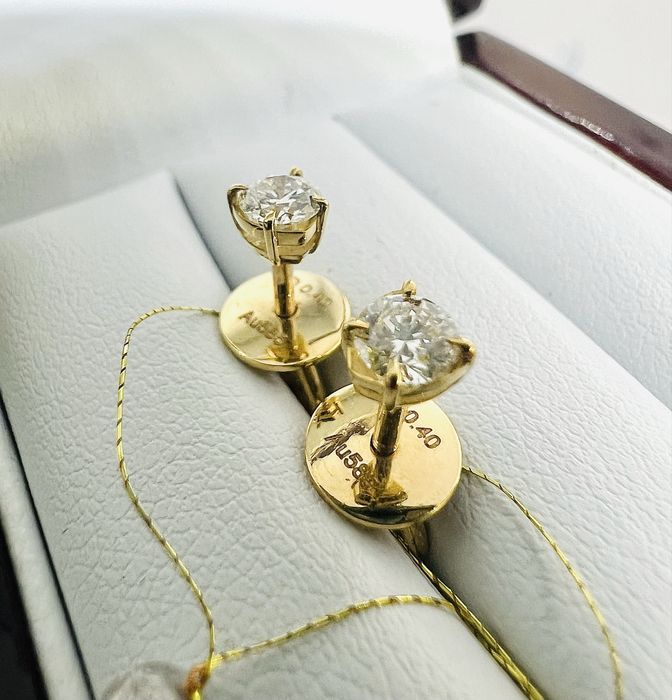 Золоті сережки пусети з діамантами 0.40 карат. Бриллианты.