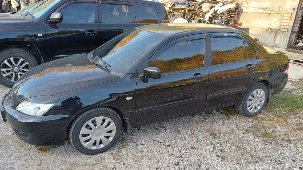 Разборка Mitsubishi Lancer 9 ланцер дверь крыло четверть  запчасти