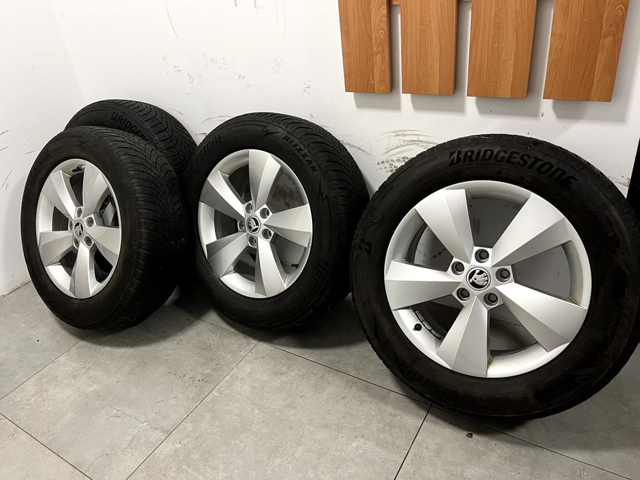 Koła zimowe alufelgi Skoda 17 5x112 ET38 215/65/17 103H Blizzak LM005