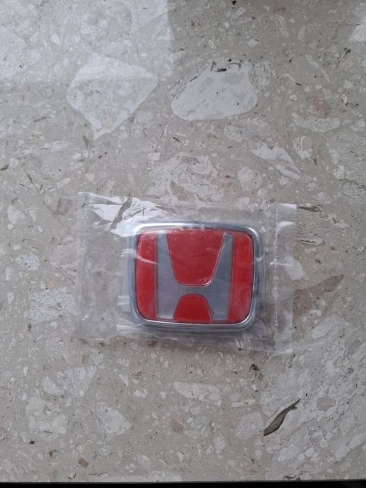 Emblemat Honda oryginalny 75711-S4T-W00 Made in Japan części do auta