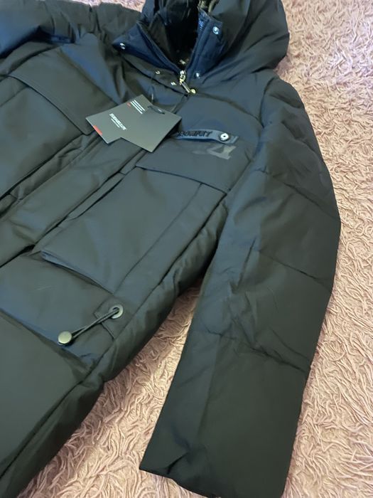 Зимова довга куртка