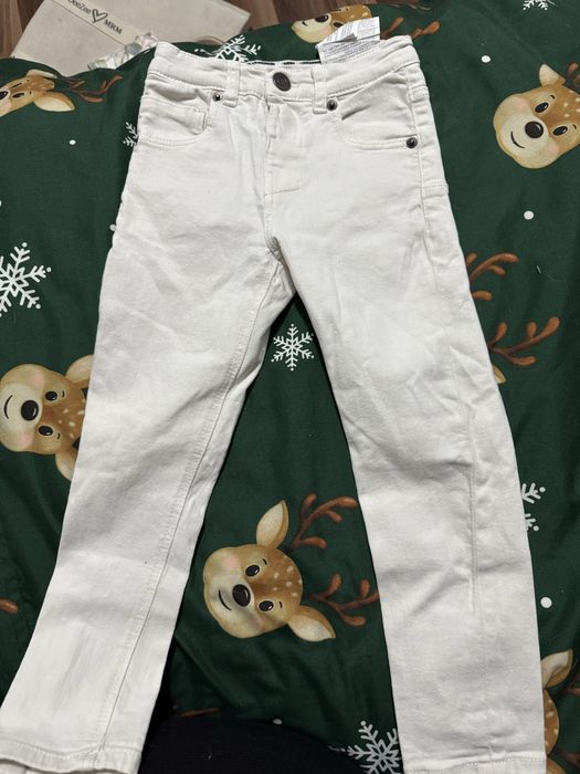 Biale jeansy zara 104