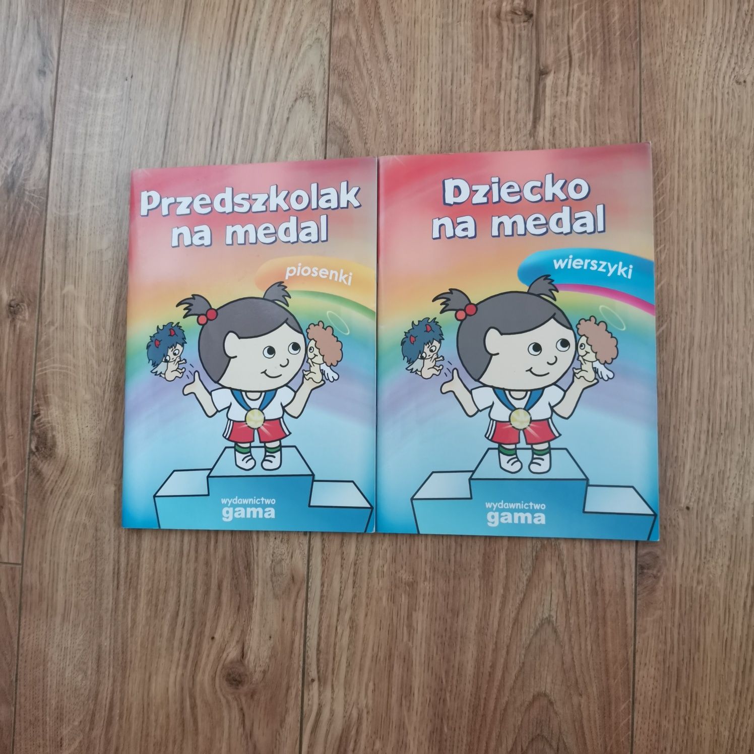 Książka dla dziecka  Przedszkolak na medal piosenki i wierszyki