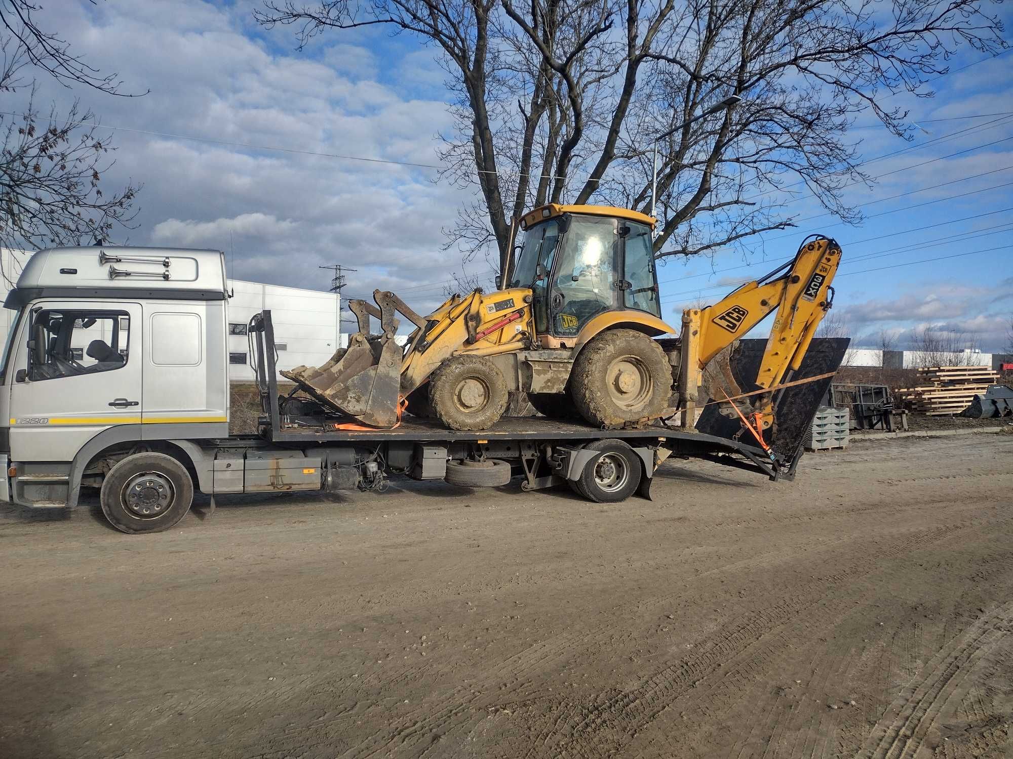 pomoc drogowa laweta  transport pojazdów maszyn rolniczych budowlanych