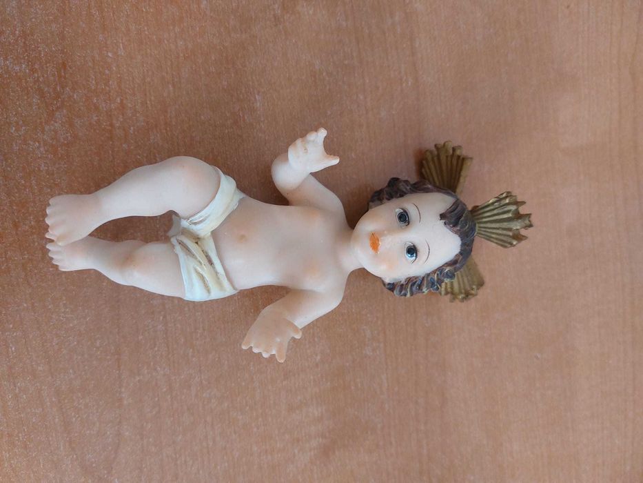 Menino Jesus com oferta de almofada