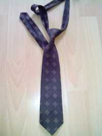ciemnobrązowy krawat, z kwadratowy wzorek