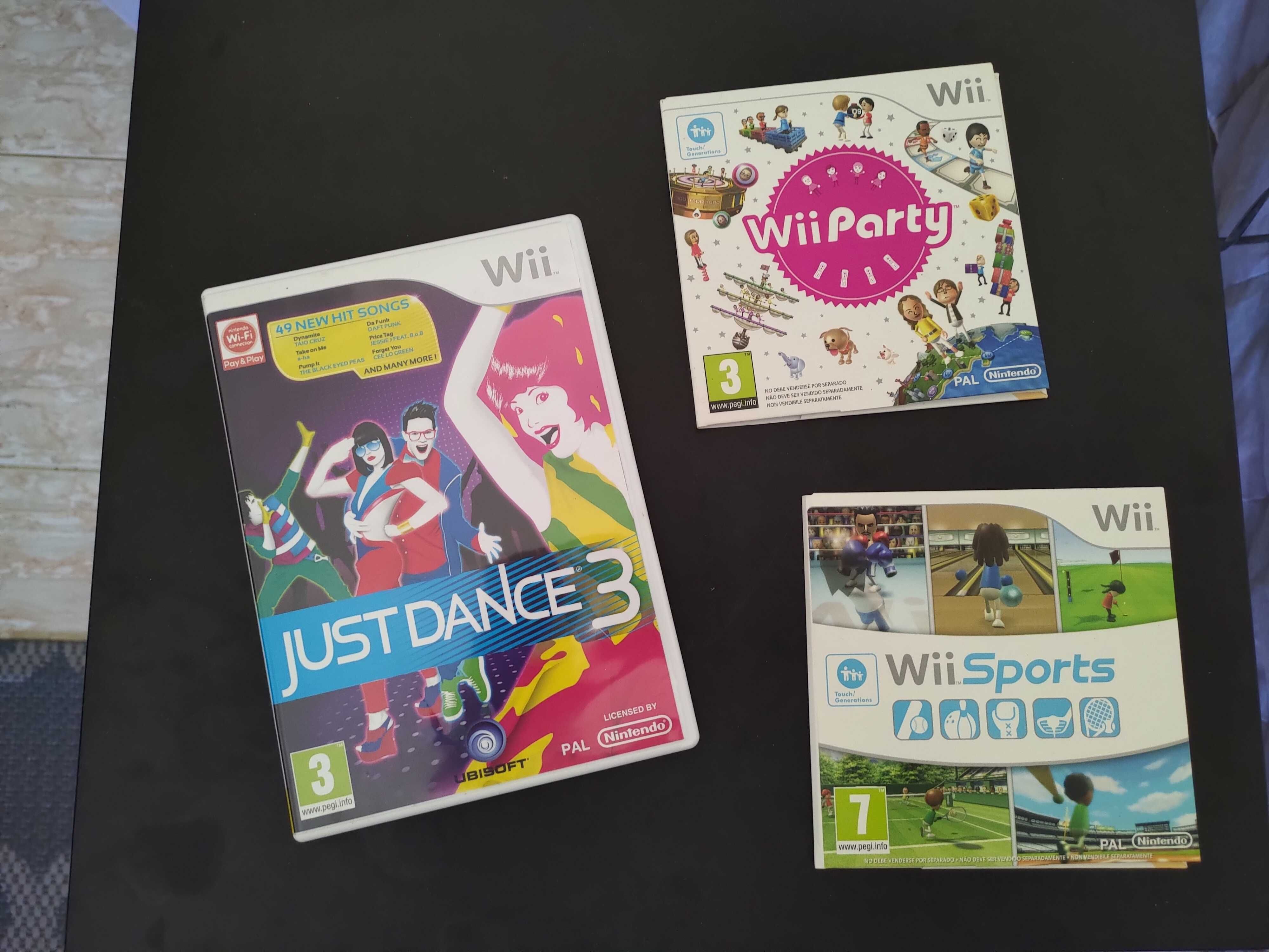 Wii + 2 Comandos com Nunchuck + Acessorios + 3 Jogos