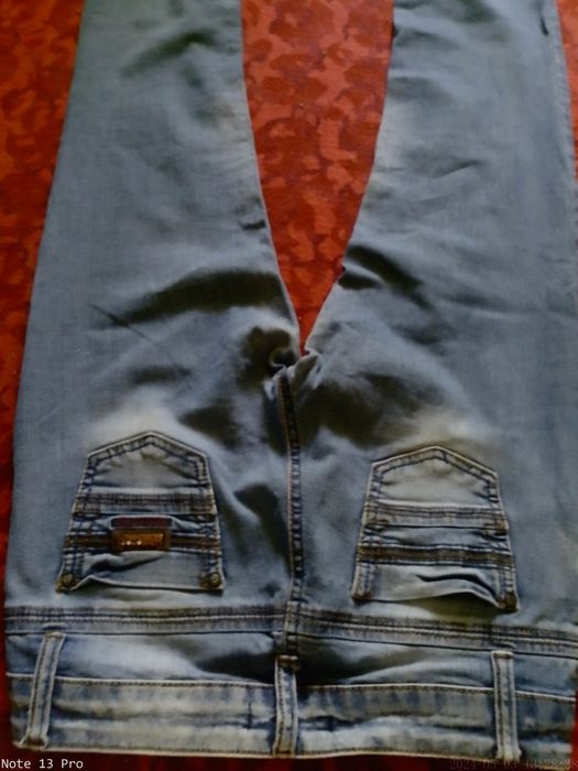 Женские брюки джинсы