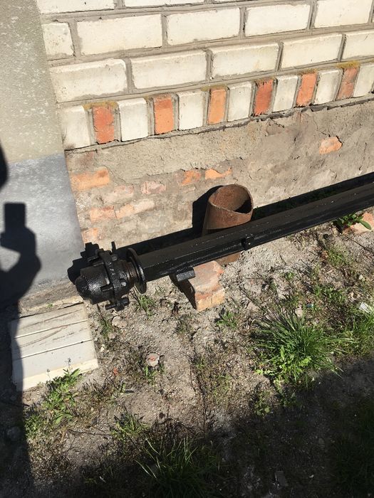 Балка з ступецями для прицепа