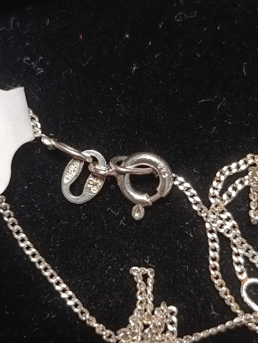 Кулон в форме сердца из желтого золота и серебра 10 карат