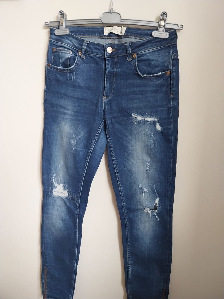 Spodnie jeansowe z rozdarciami Gina Tricot rozmiar M/38