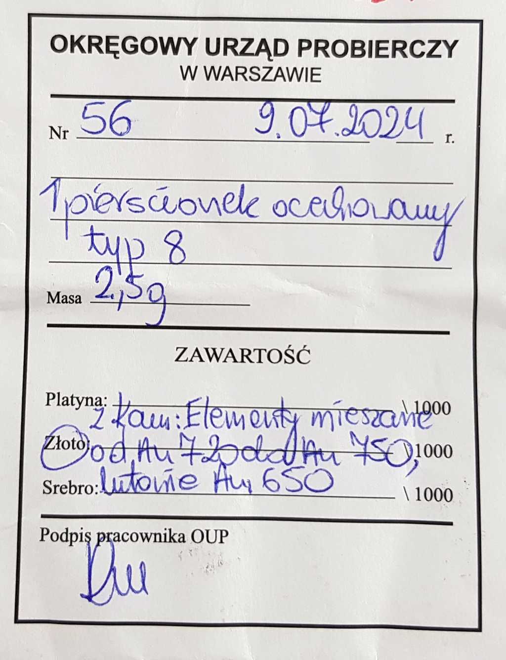 Złoty pierścionek zdobiony brylantem około 0,16 ct