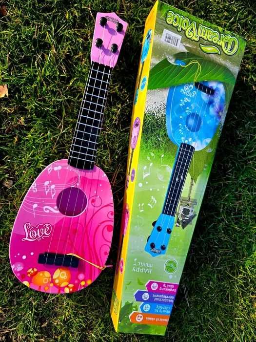 Zabawkowa gitara różowa _ nowe ukulele dla dziecka