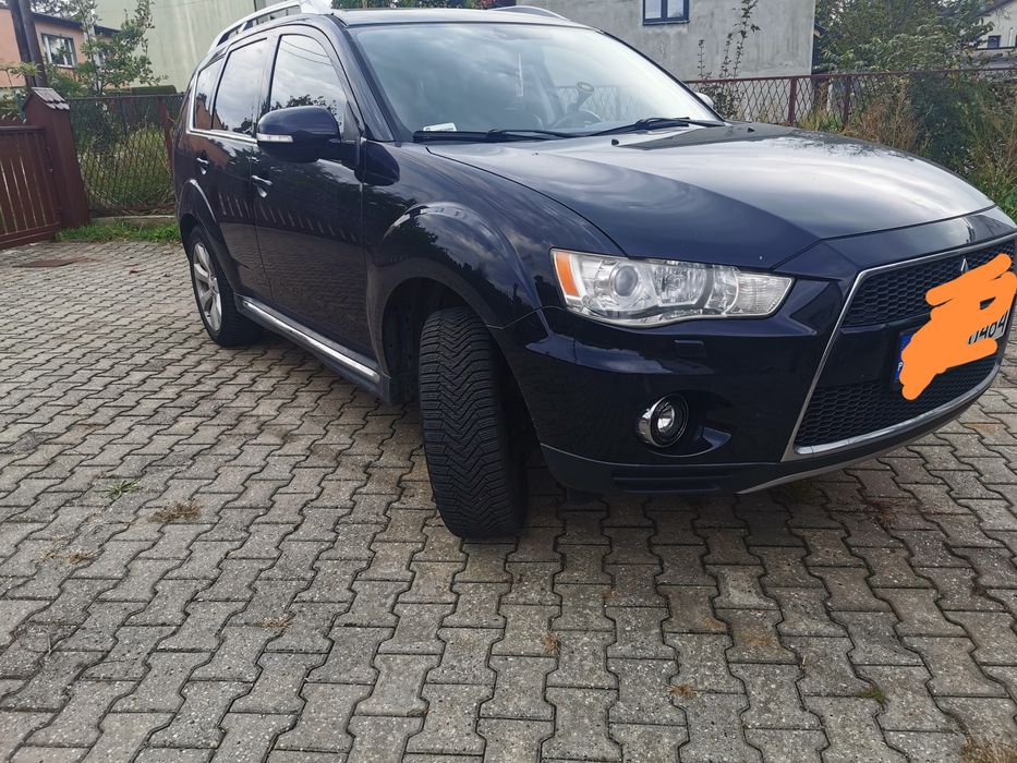 Mitsubishi Outlander 7 os 2010r sprzedam  zamienię na łódź kabinowa