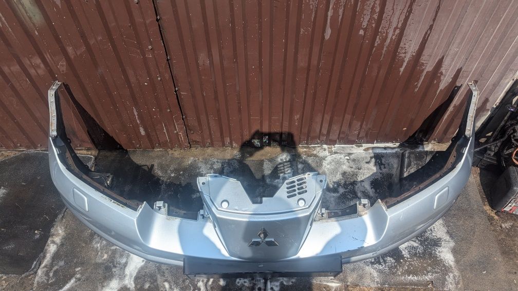 Передній бампер mitsubishi outlander MR971529