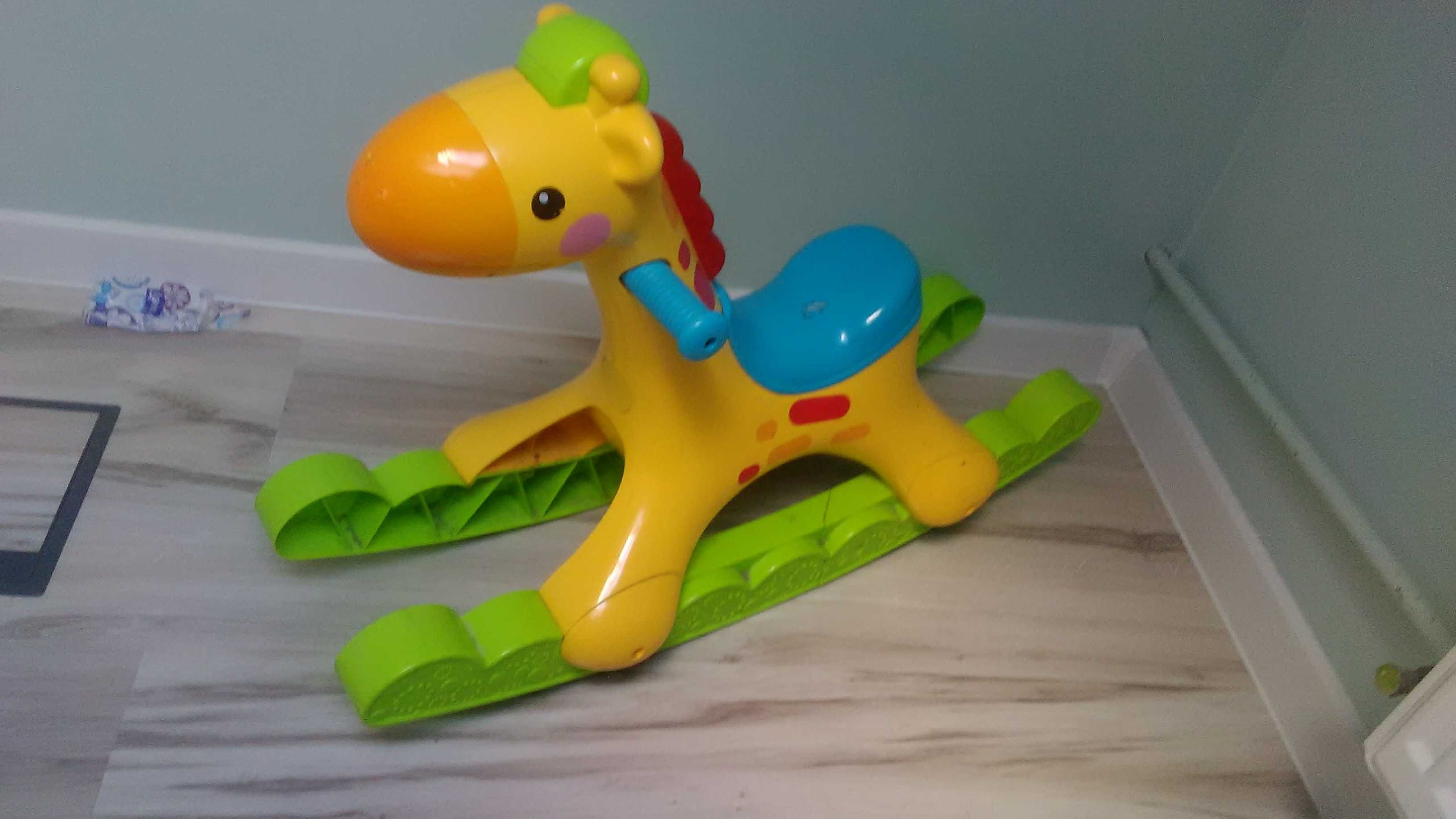 Konik na biegunach żyrafa bujana grająca fisher price