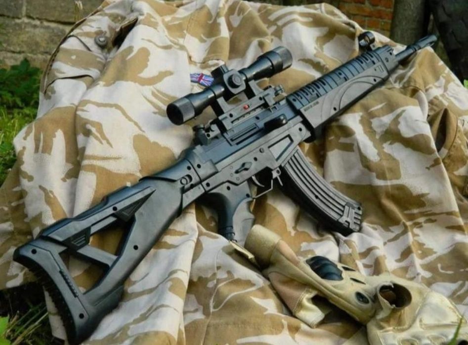 Дитячий іграшковий автомат з лазерним прицілом на пульках