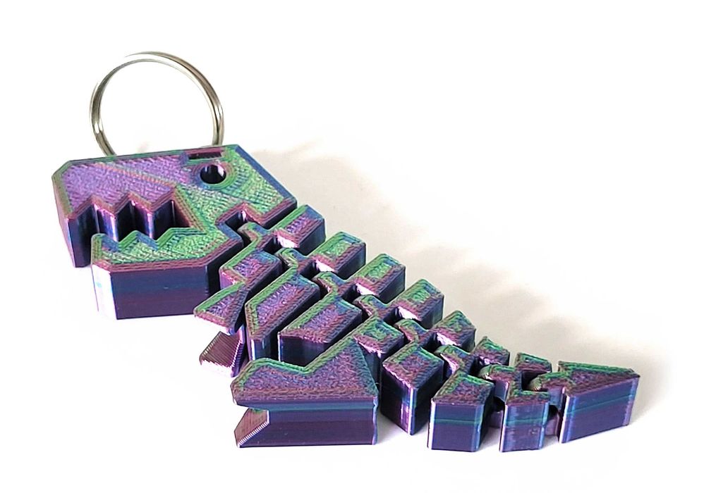 Brelok do kluczy flexi dinozaur dinus 3 kolorowy