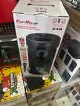 Coluna com microfone para karaoke