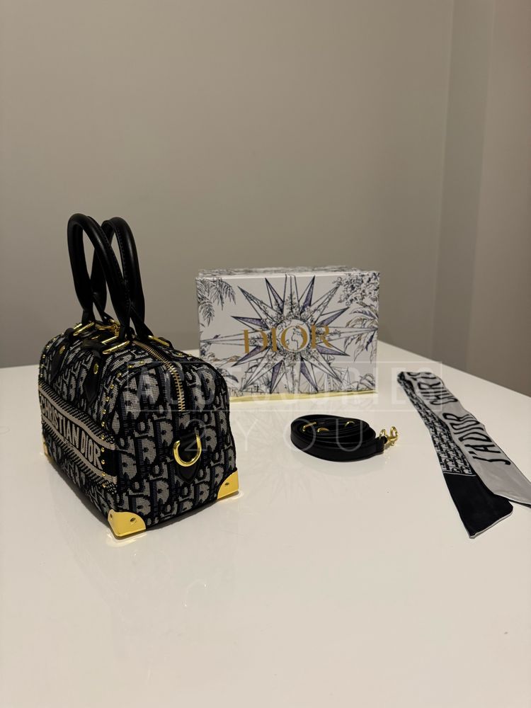 Mala       Dior