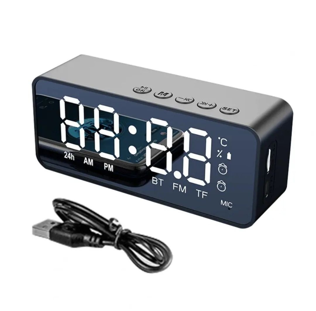 Настільний годинник,колонка, градусник та радіо в одному пристрої.