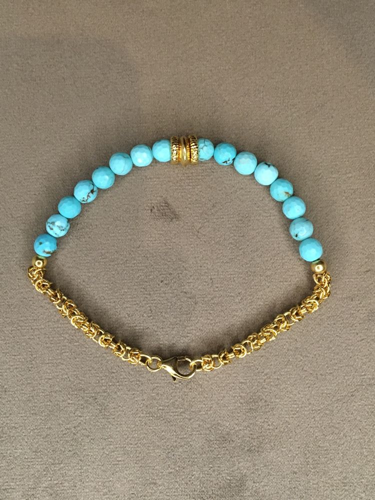 Pulseira em prata dourada e turquesas