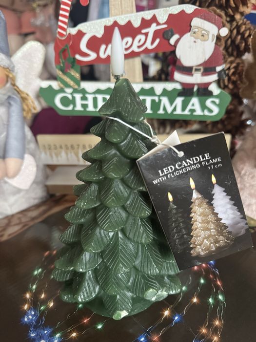 Новорічні лед свічки і звичайні святкові свічки