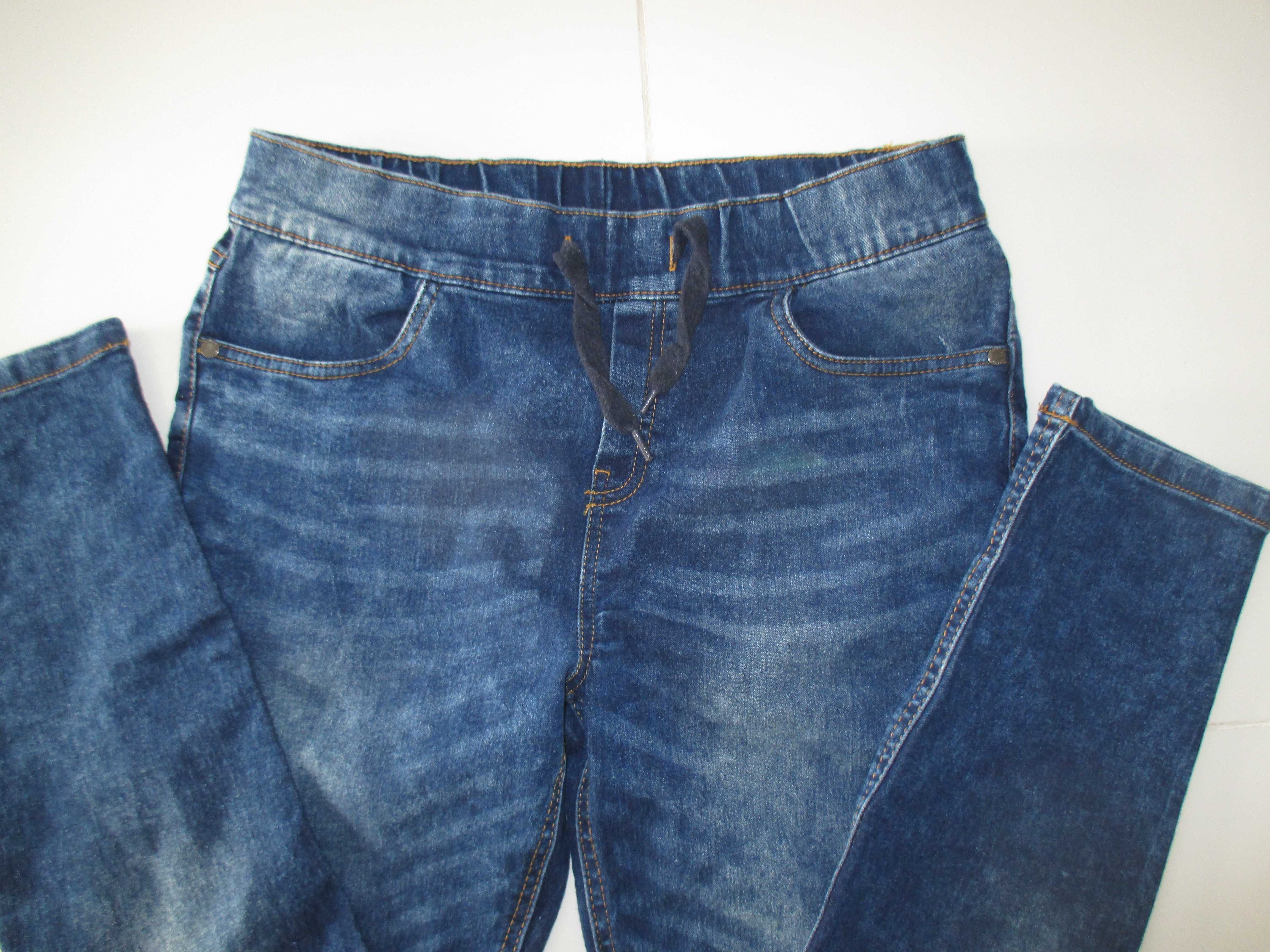 229* Spodnie chłopięce 164 cm jeansy
