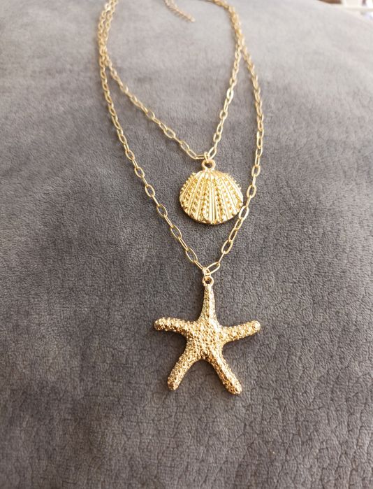 Colar de verão com estrela do mar e concha.

#colar #colaresfemininos