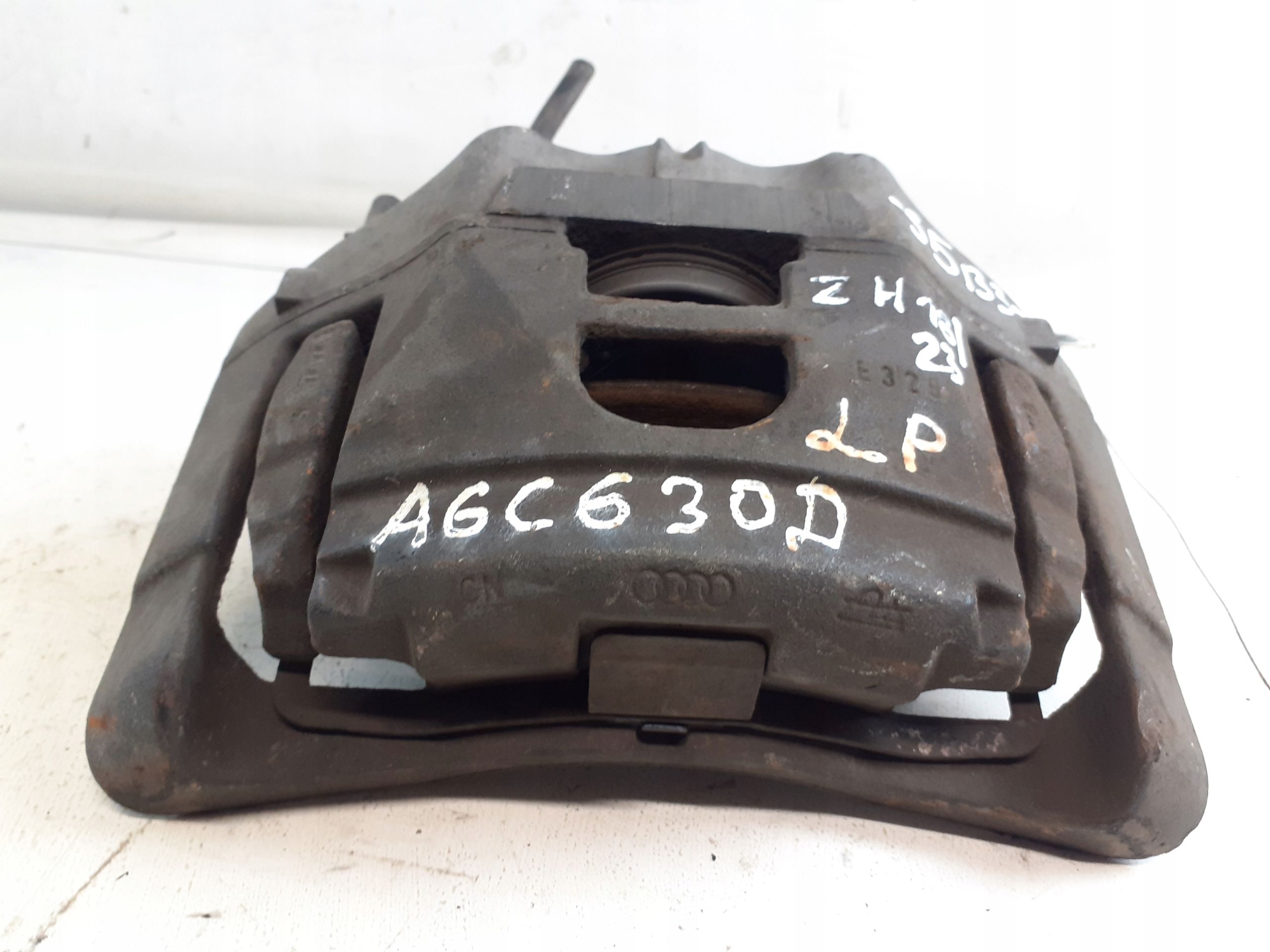 Zacisk Lewy Przod Przedni Audi A6 C6 3.0 TDI