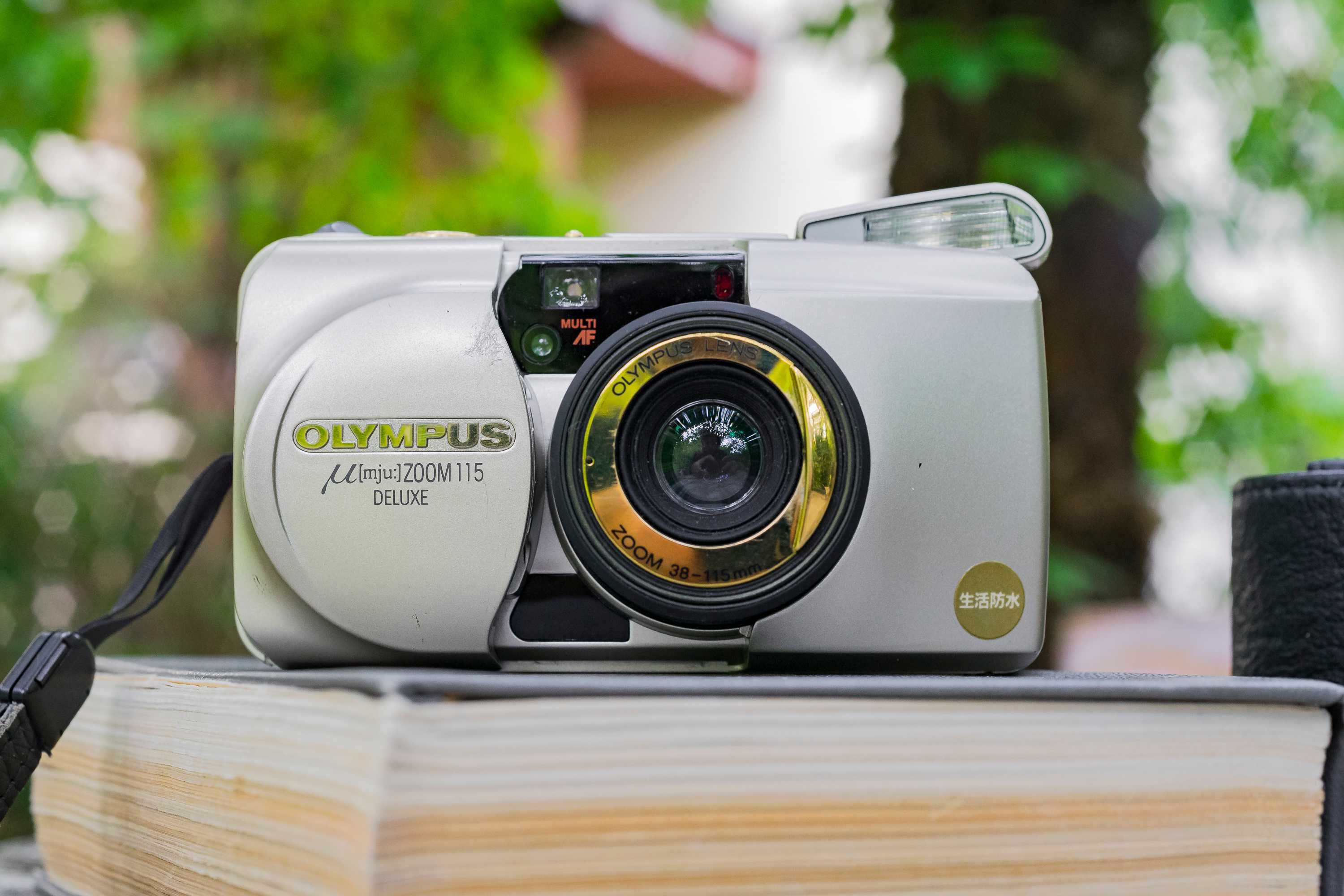 Olympus uMJU Zoom 115 Deluxe Gold aparat analogowy małpka futerał
