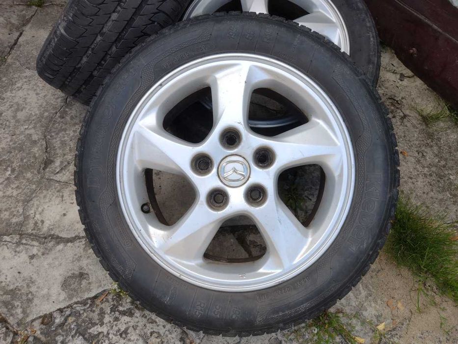 Mazda Felgi 15 cali Alu plus opony letnie 15x6JJ 5x114,3 ET50