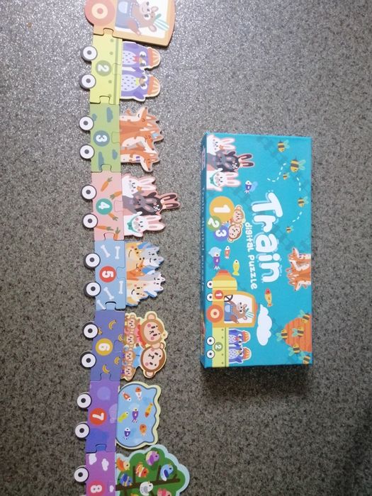 Гра пазл Звірі на поїзді