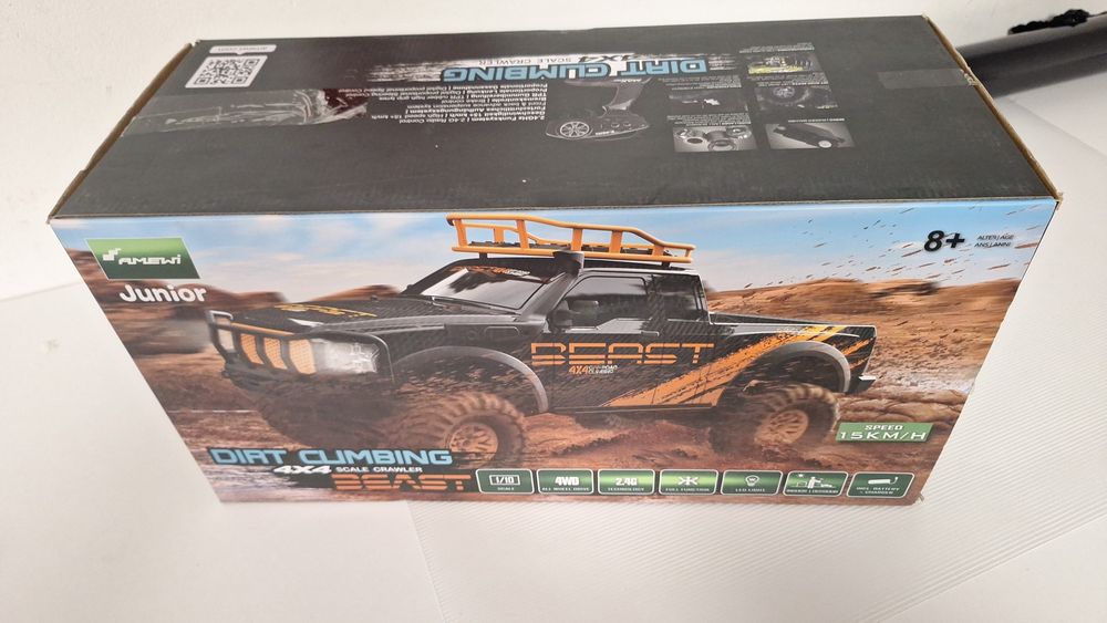 Amewi Climbing Beast Pick-Up Crawler 4WD 1:10 RTR, czarno-pomarańczowy
