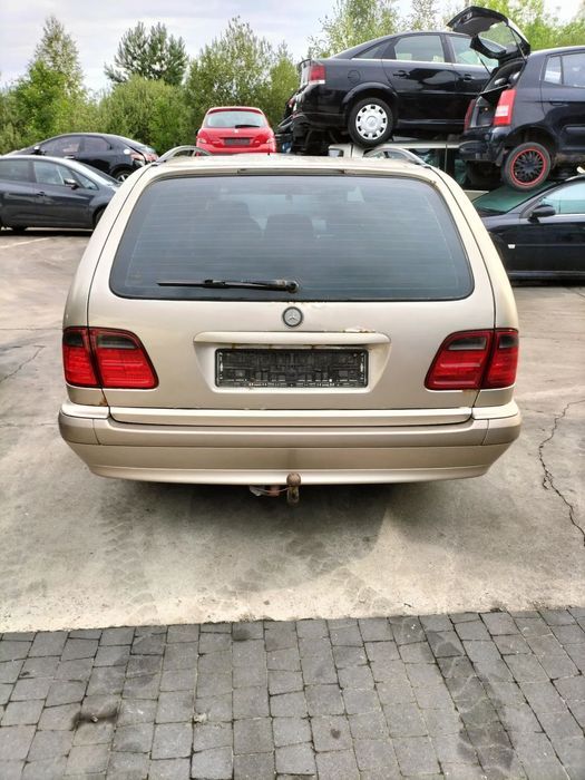 BŁOTNIK LEWY PRAWY MERCEDES W210 LIFT KOD LAKIERU 693