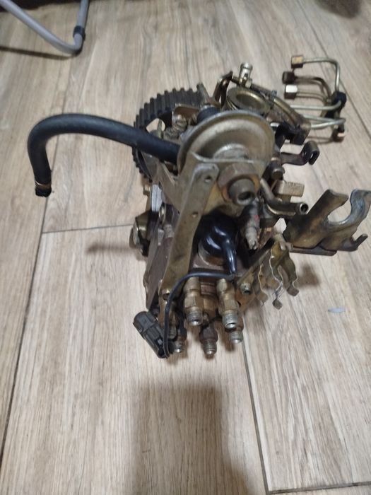 Bomba injetora de Nissan e motor de arranque