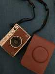 Instax Mini Evo Castanha