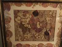 Quadro artesanal com flores secas