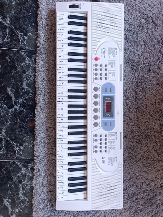 Piano branco grande 80 cm de comprimento por 26 largura