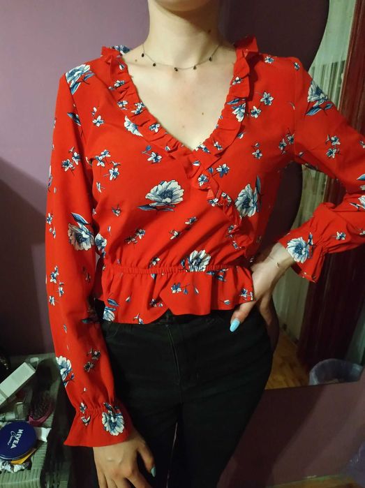 Cudowna bluzka z falbanką  H&M