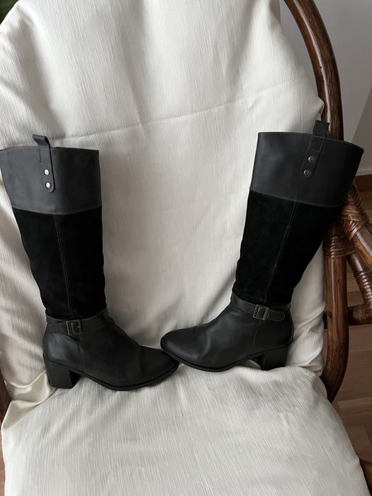 Botas pretas de cano alto