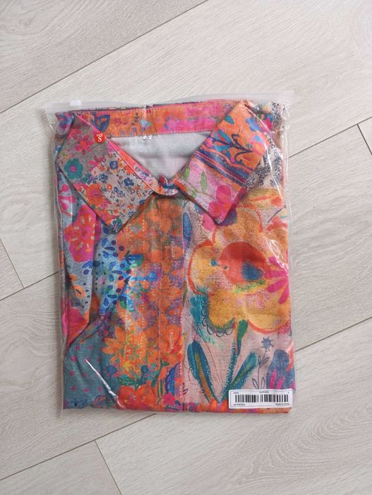 Piękna kolorowa koszula kolory i wzór boho hippie etniczna
S / 36