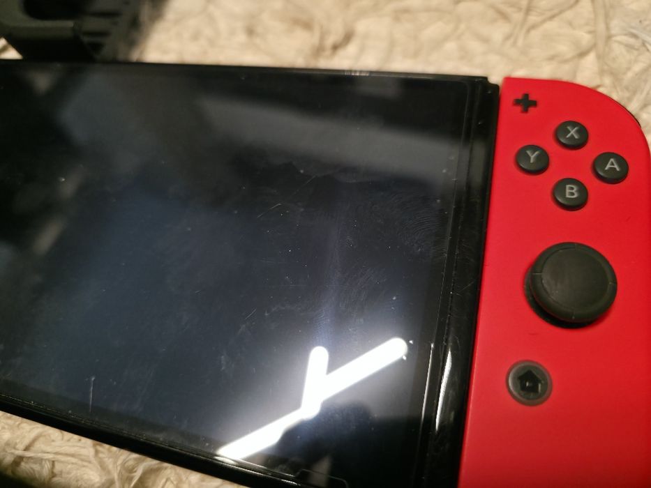 konsola Nintendo Switch OLED gry etui pokrowiec karta pamięci zestaw