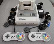 Nintendo SNES + 2 pady + zasilacz + kabel do tv + super game boy