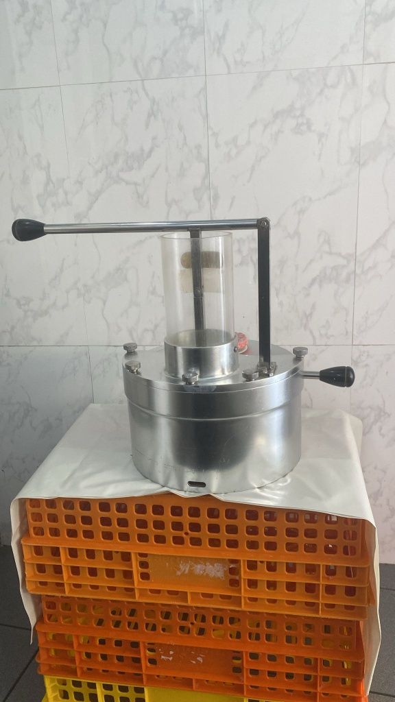 Maquina transformadora de hamburgueres