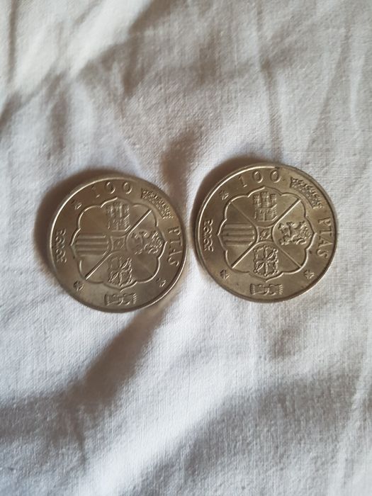 Escudos e pesetas